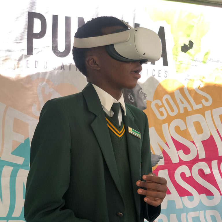 Student trying a VR headset at a Punzila virtual campus tour